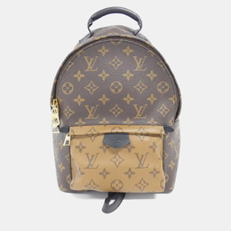 Louis Vuitton: Коричневый рюкзак 