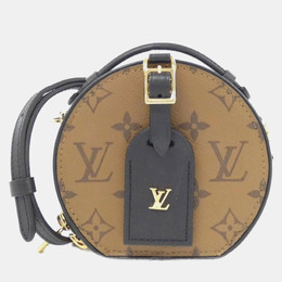 Louis Vuitton: Коричневая сумка 