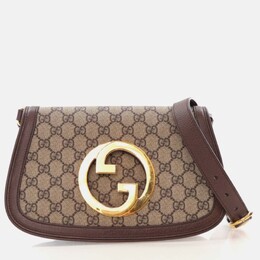 Gucci: Коричневая сумка  GG