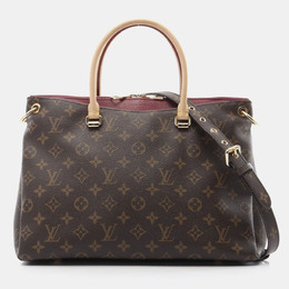 Louis Vuitton: Коричневая сумка 