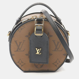 Louis Vuitton: Коричневая сумка 