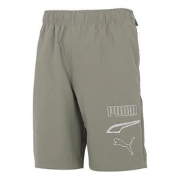 PUMA: Зелёные шорты  Rebel