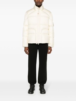 Moncler: Бежевый пуховик 