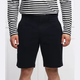 Tommy Hilfiger: Шорты  1985 свободного кроя