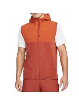 Nike: Оранжевый жилет  Therma