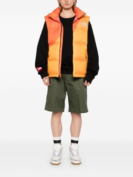 The North Face: Оранжевый жилет 
