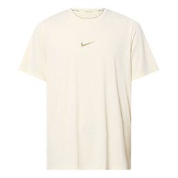 Nike: Бежевая футболка  Dri FIT