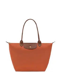 Longchamp: Оранжевая сумка  Le Pliage