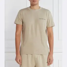 Calvin Klein: Бежевая футболка 