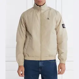 Calvin Klein: Бежевая куртка 