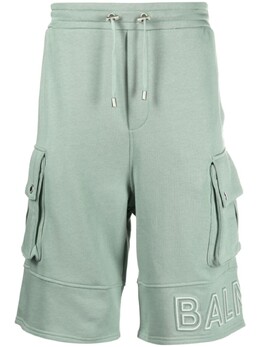 Balmain: Зелёные шорты 
