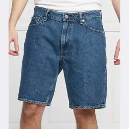 GUESS: Джинсовые шорты 