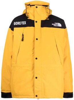 The North Face: Оранжевая куртка  Mountain