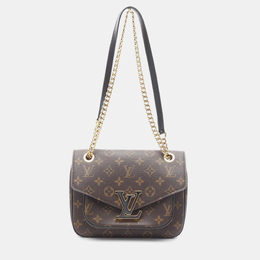 Louis Vuitton: Коричневая сумка 