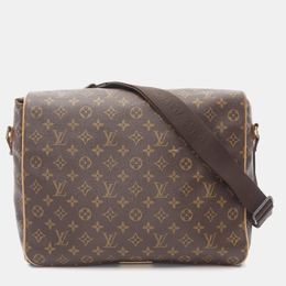Louis Vuitton: Коричневая сумка 