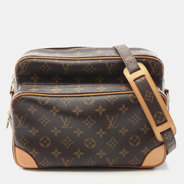 Louis Vuitton: Коричневая сумка 