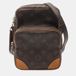 Louis Vuitton: Коричневая сумка 