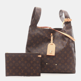 Louis Vuitton: Коричневая сумка 