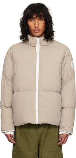 Canada Goose: Бежевый пуховик 
