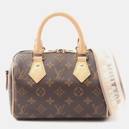 Louis Vuitton: Коричневая сумка через плечо  Speedy