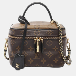 Louis Vuitton: Коричневая сумка 