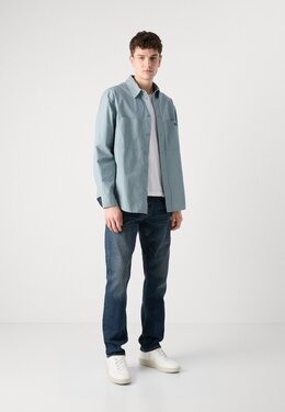 Calvin Klein Jeans: Серая рубашка 