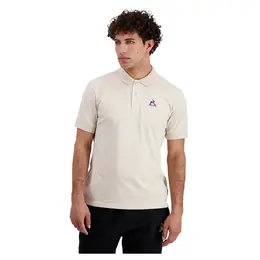 Le Coq Sportif: Бежевое поло 