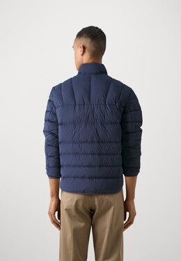 Tommy Hilfiger: Светлый пуховик  Tommy Jeans