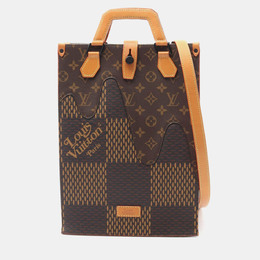 Louis Vuitton: Коричневая сумка-шоппер 