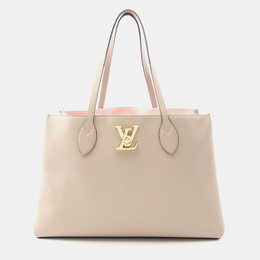 Louis Vuitton: Бежевая сумка-шоппер 