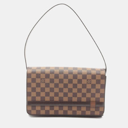 Louis Vuitton: Коричневая сумка 