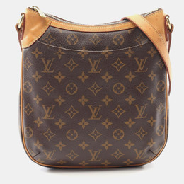 Louis Vuitton: Коричневая сумка 