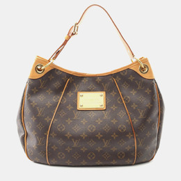 Louis Vuitton: Коричневая сумка 