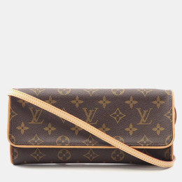 Louis Vuitton: Коричневая сумка  Pochette