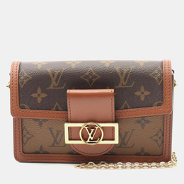 Louis Vuitton: Коричневая сумка 