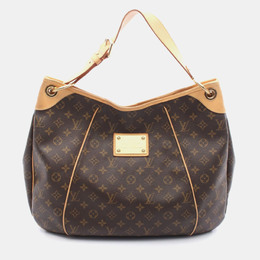 Louis Vuitton: Коричневая сумка 