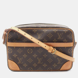 Louis Vuitton: Коричневая сумка через плечо 