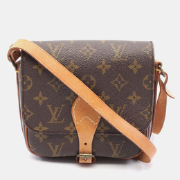 Louis Vuitton: Коричневая сумка 