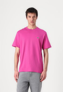 Lacoste: Розовая футболка 