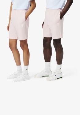Lacoste: Розовые шорты 