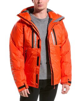 Canada Goose: Оранжевый пуховик 