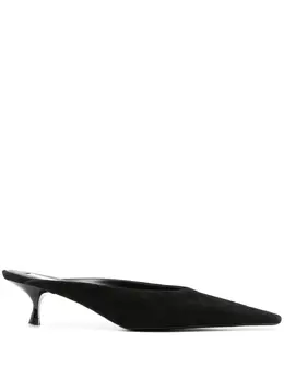 Victoria Beckham: Чёрные сабо 