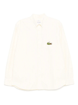 Lacoste: Жёлтая футболка 