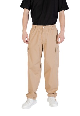 Calvin Klein Jeans: Бежевые брюки 
