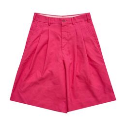 Comme des Garçons Homme Plus: Яркие шорты 