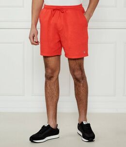 Tommy Jeans: Оранжевые шорты 