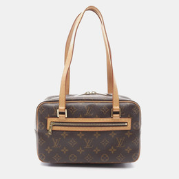 Louis Vuitton: Коричневая сумка 