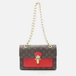 Louis Vuitton: Коричневая сумка 