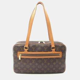 Louis Vuitton: Коричневая сумка 