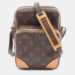 Louis Vuitton: Коричневая сумка 